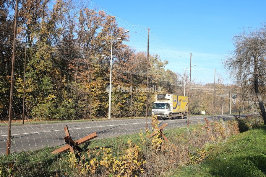 A truck drives along a road covered with an anti-drone net, Kharkiv, Ukraine, October 24, 2026. Anti-drone nets are being installed to protect civilians and vehicles from Russian UAV strikes