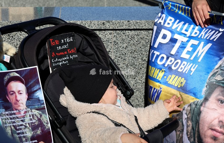 A baby sits in a stroller during the “Don’t Stay Silent! Captivity Kills!” rally in support of Ukrainian prisoners of war and MIAs, Kharkiv, Ukraine, October 25, 2026