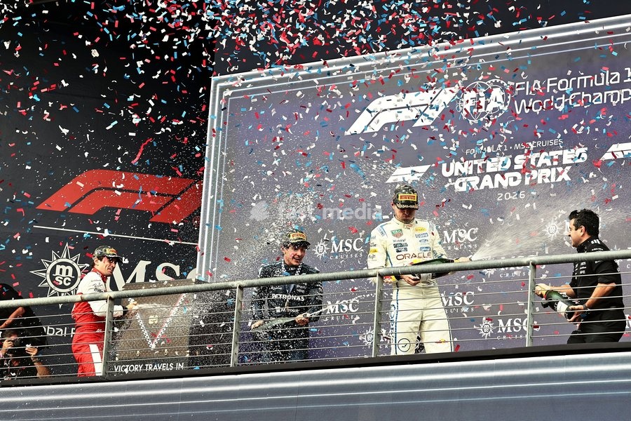 AUSTIN, UNITED STATES - OCTOBER 25: Charles Leclerc of Monaco and Scuderia Ferrari HP sprays champagne on the podium during the race of the Formula 1 MSC Cruises United States Grand Prix 2026 at Circuit of the Americas on October 25, 2026 in Austin, United States