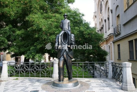 JAROSLAV RÓNA. Franz Kafka (1883-1924). German Jewish novelist. Sculpture by Jaroslav Rona (b. 1957), inspired by Kafka's short story "Description of a Struggle". It is located in front of the Spanish synagogue, Jewish quarter. Prague, Czech Republic