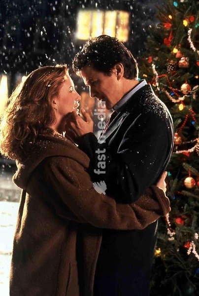 Melissa Gilbert, Tim Matheson Jake (Tim Matheson), der mit der Schliessung der hiesigen Fabrik beauftragt wurde, geht in sich und entscheidet sich schliesslich fuer die Stadt - und fuer Emma (Melissa Gilbert). *** Local Caption *** 1996, Holiday For Love, A, Eingeschneite Herzen - Ein Romantisches…