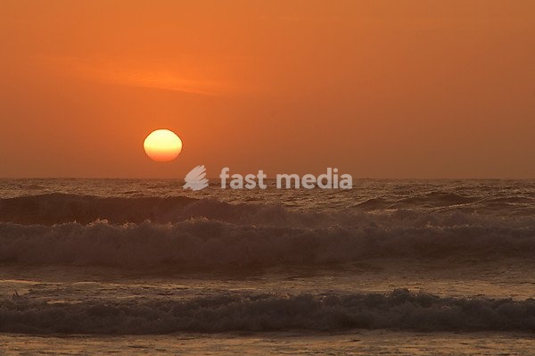 Sunset on the beach at Barriga, Portugal, Europe