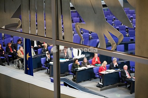 Parliamentary session in the Plenary Assembly Hall of the Reichstag building, part of the German federal eagle is in the foreground, Berlin, Germany, Europe