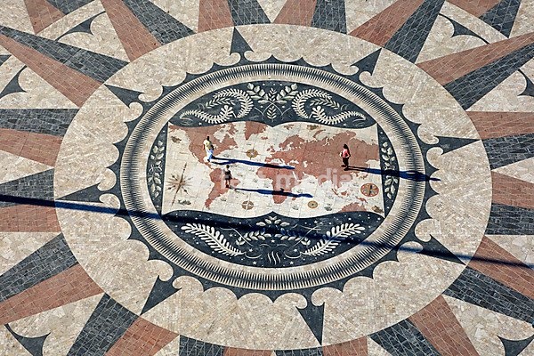 Large compass with world map on the pavement, with tourists, outside the Padráo dos Descobrimentos, Monument to the Discoveries, Belem, Lisbon, Portugal, Europe