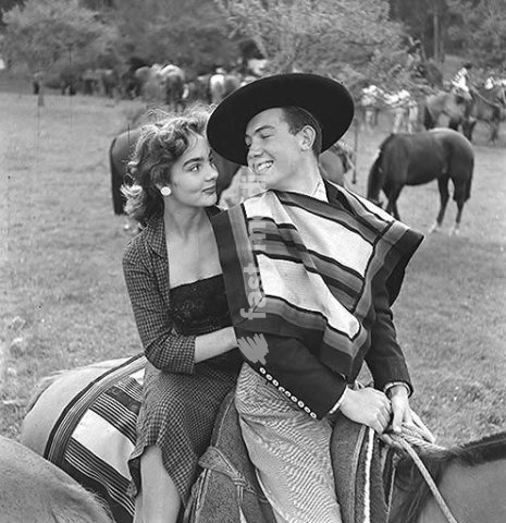 Ethnology / Latin America. Gaucho with a young lady on his horse during the annual celebration of the Chilean "Guasos" (Gauchos), "Medialuna", in Rocangua. Photo 1965