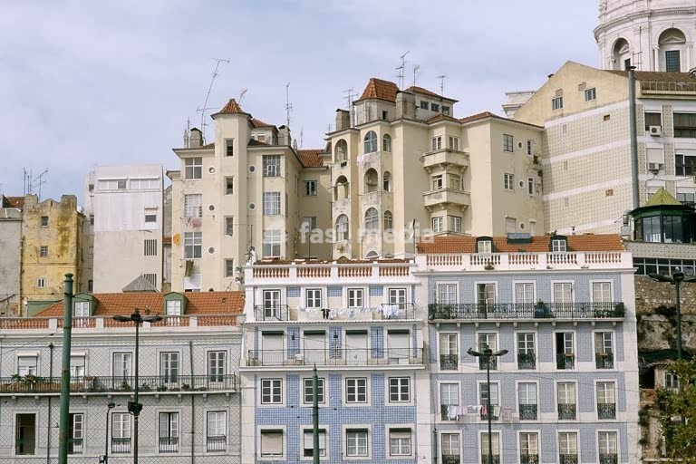 Lisbon (Portugal), Alfama (old town quarter on southeast slope of the castle hill). Partial view: buildings in the Santa Apolonia quarter below the Panteao Nacional. Photo, undated