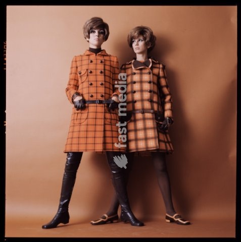 Fashion: Women's fashion / 1960s. Two models wearing red coats. Photo, France, 1960s