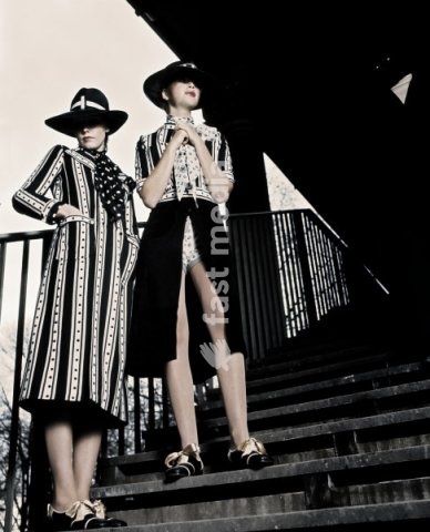 Fashion: Women's fashion, 1960s. Two models on stairs. Photo, Paris, undated, c. 1960