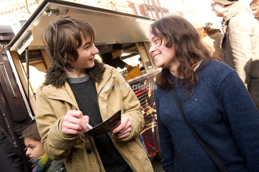 Isaac Hempstead Wright who plays Bran Stark in the series Game of Thrones by the Game of Thrones Westeros Food Wagon to celebrate the release of Season Two on DVD and Blu-ray, Tottenham Court Road.,London
