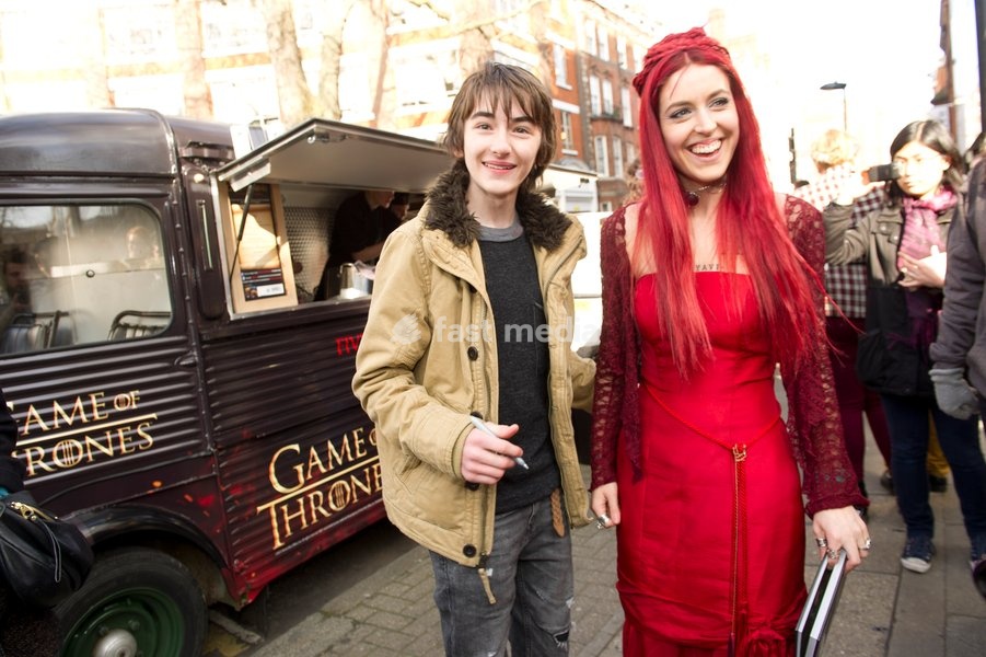 Isaac Hempstead Wright who plays Bran Stark in the series Game of Thrones by the Game of Thrones Westeros Food Wagon to celebrate the release of Season Two on DVD and Blu-ray, Tottenham Court Road.,London
