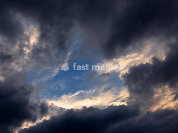 Dark, overcast evening sky