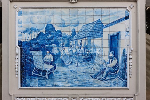 Azulejo, mural made of ceramic tiles, farmers weaving wicker objects, in Funchal