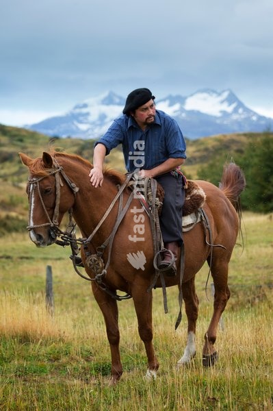Gaucho sitting on horse ready for a ride.Patagonia.Chile