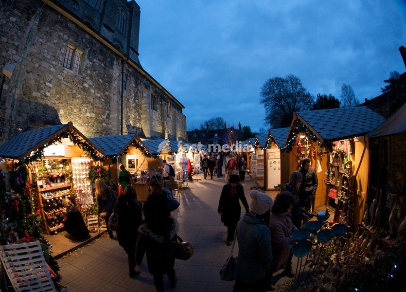 Winchester Christmas Market in the grounds of Winchester Cathedral Hampshire England
