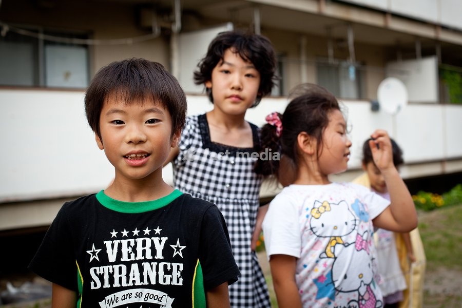 Wakabayashi Ward, Sendai, Japan. Sota Hatakeyama (foreground) and friends at a temporary housing complex, where they were sent after their houses were destroyed in the 2011 tsunami. The adults here talked about relations being strained - Japanese people like space and are relatively private people.…