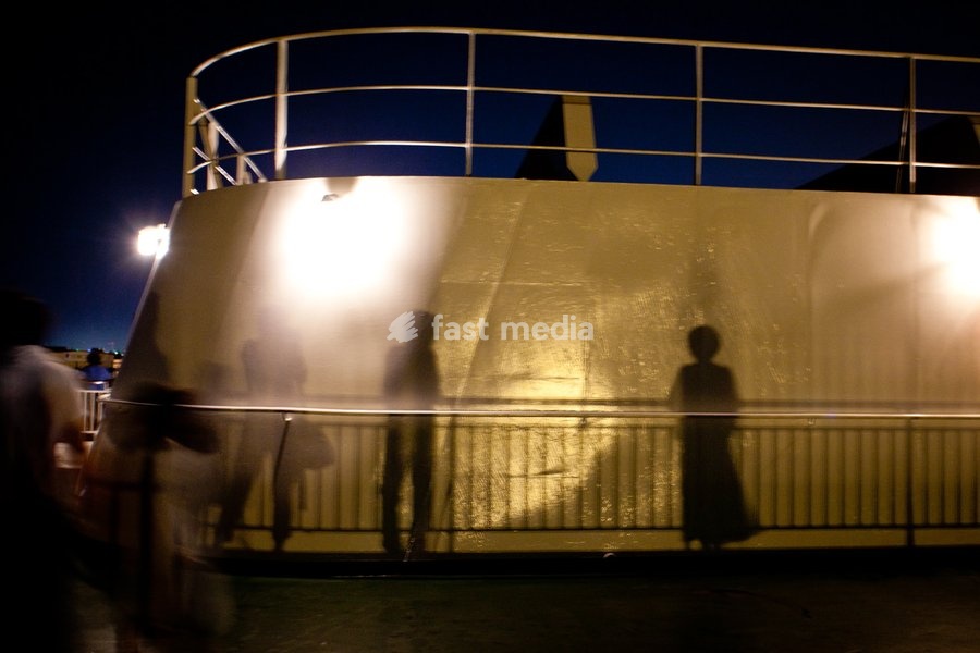 Shadow on a ferry, Sendai port, Japan. The ghosts of Sendai - around 25,000 Japanese were killed following the tsunami in 2011. A tsunami warning was put out quickly after the detection of the earthquake, and then less than half an hour until the tsunami struck. With protective sea walls not high…