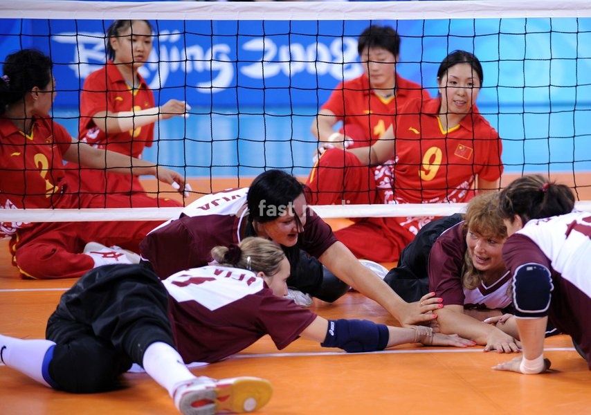 (080907) -- BEIJING, Sept. 7, 2008 -- Players of Latvia celebrate for scoring during the women's sitting volleyball preliminary match between Latvia and China of the Beijing 2008 Paralympic Games in Beijing, China, Sept. 7, 2008. China won the match 3-0. (Yang Zongyou)(wx)