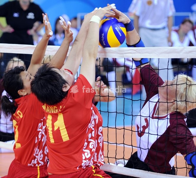 (080907) -- BEIJING, Sept. 7, 2008 -- Nellija Rusina(#3) of Latvia attacks during the women's sitting volleyball preliminary match between Latvia and China of the Beijing 2008 Paralympic Games in Beijing, China, Sept. 7, 2008. China won the match 3-0. (Yang Zongyou)(wx)