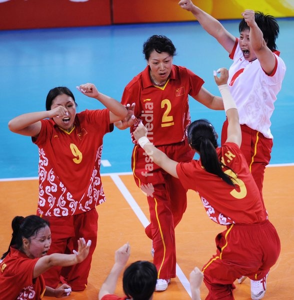 (080909) -- BEIJING, Sept. 9, 2008 -- Members of Chinese team celebrate victory after the women's sitting volleyball preliminary match between China and the United States of the Beijing 2008 Paralympic Games in Beijing, China, Sept. 9, 2008. China won the match 3-0. ( Yang Zongyou)(wx)