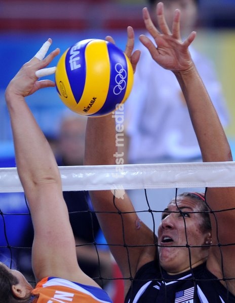 (080912) -- BEIJING, Sept. 12, 2008 -- Katie Holloway of the Untied States (R) blocks during the semifinal against the Netherlands in the women's sitting volleyball at the Beijing 2008 Paralympic Games in Beijing, China, Sept. 12, 2008. The United States won 3-2 and advanced into the final. ( Yang…