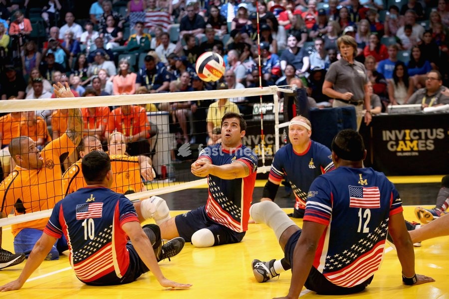 (bl) USA play the Netherlands at sitting volleyball during the Invictus Games Orlando 2016 at ESPN Wide World of Sports on May 10, 2016 in Orlando, Florida. Prince Harry, patron of the Invictus Games Foundation is in Orlando for the Invictus Games 2016. The Invictus Games is the only International…