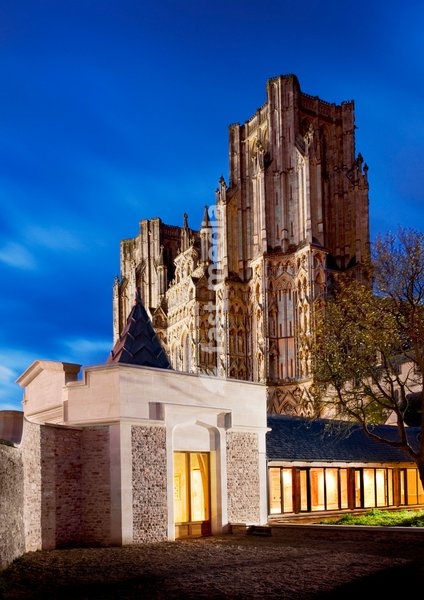 Wells Cathedral, Somerset, 2009. View of the new entrance cloister and west front of the cathedral at twilight