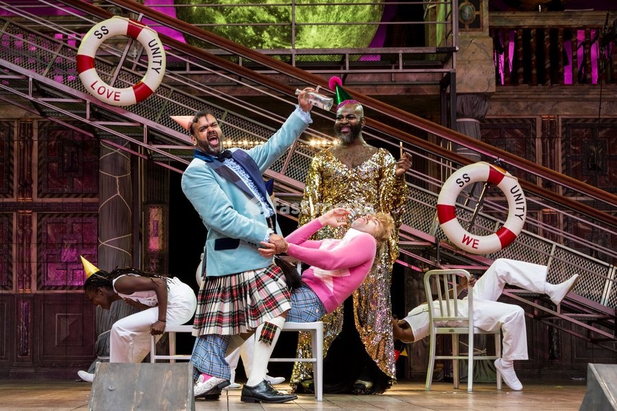 Tony Jayawardena, Marc Antolin, Le Gateau Chocolat. Photocall for William Shakespeare's Twelfth Night directed by Emma Rice at the Globe Theatre, Shakespeare's Globe. With Marc Antolin (Sir Andrew Aguecheek), Carly Bawden (Maria), Nandi Bhebhe (Fabian), Le Gateau Chocolat (Feste), Tony Jayawardena…