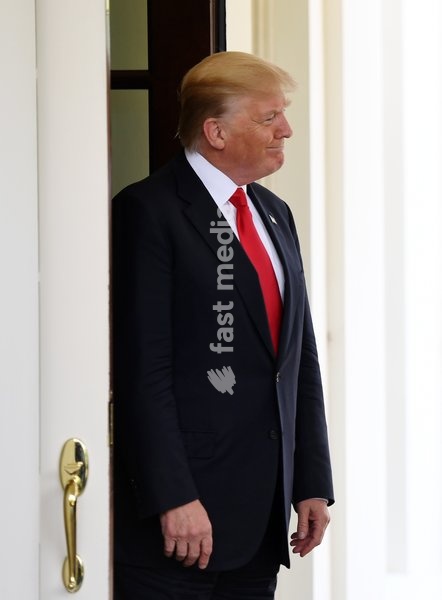 (170531) -- WASHINGTON, May 31, 2017 () -- U.S. President Donald Trump awaits the arrival of Vietnamese Prime Minister Nguyen Xuan Phuc at the White House in Washington D.C., the United States, on May 31, 2017. U.S. President Donald Trump said Wednesday that the world would know his decision on the…