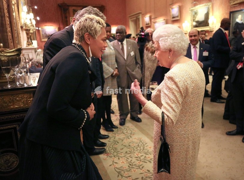 Queen Elizabeth II talks to Monica Galetti at a reception to celebrate the Commonwealth Diaspora community, in the lead up to the Commonwealth Heads of Government meeting in London this April, at Buckingham Palace, London