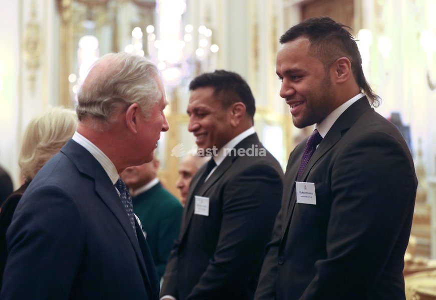 The Prince of Wales meets rugby players Mako (2nd right) and Billy Vunipola at a reception to celebrate the Commonwealth Diaspora community, in the lead up to the Commonwealth Heads of Government meeting in London this April, at Buckingham Palace, London