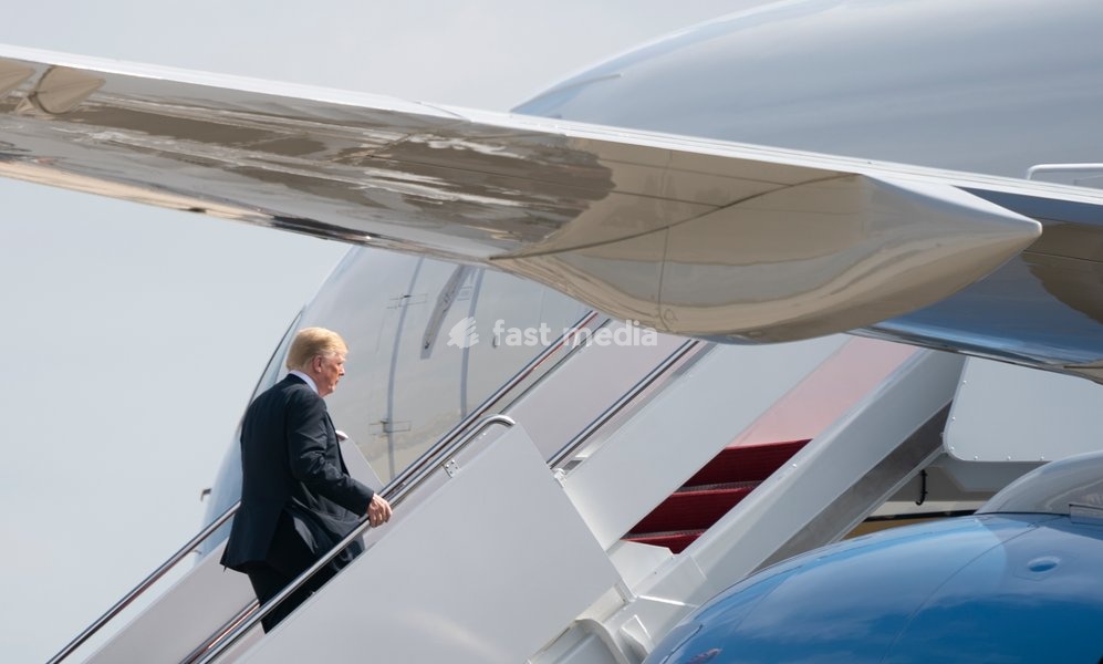 United States President Donald J. Trump boards Air Force One at Joint Base Andrews, Maryland, en route to events in Illinois, Missouri and Iowa, July 26, 2018