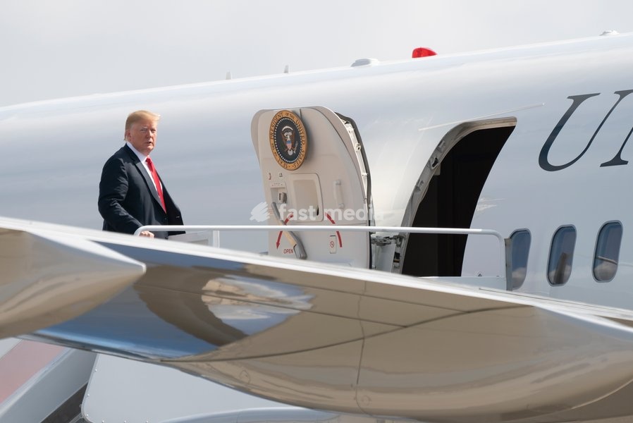 United States President Donald J. Trump boards Air Force One at Joint Base Andrews, Maryland, en route to events in Illinois, Missouri and Iowa, July 26, 2018