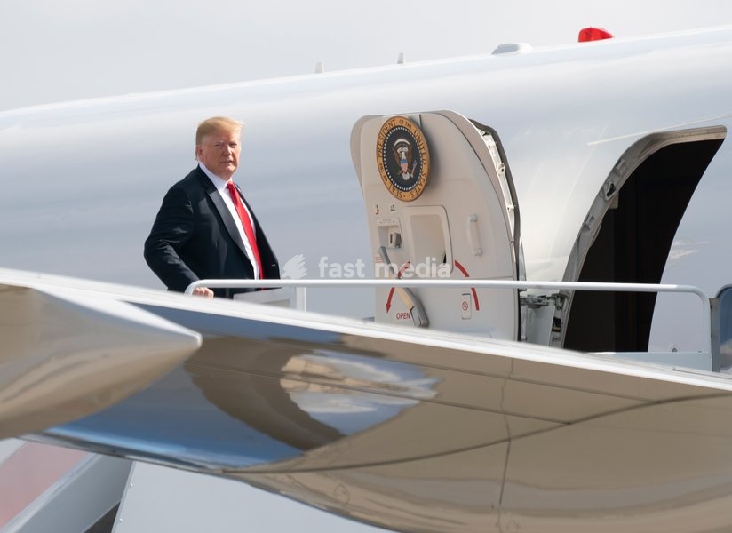 United States President Donald J. Trump boards Air Force One at Joint Base Andrews, Maryland, en route to events in Illinois, Missouri and Iowa, July 26, 2018
