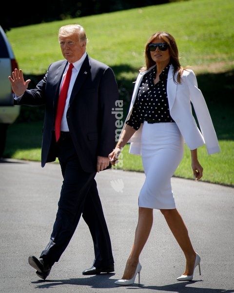 (180824) -- WASHINGTON, Aug. 24, 2018 () -- U.S. President Donald Trump and First Lady Melania Trump depart from the White House in Washington D.C., the United States, on Aug. 24, 2018. U.S. President Donald Trump on Friday tweeted that he has asked Secretary of State Mike Pompeo to cancel his…