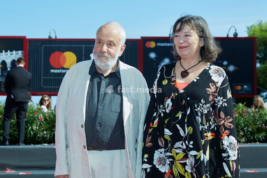 Director Mike Leigh and Marion Bailey walk the red carpet ahead of the 'Peterloo' screening during the 75th Venice Film Festival at Sala Grande on September 1, 2018 in Venice, Italy. (0)