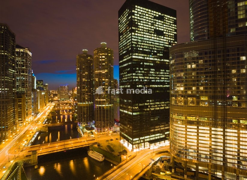 Buildings along Wacker Drive and the Chicago River at dusk, Marina City centre, Trump Tower on right, Chicago, Illinois, United States of America, North America