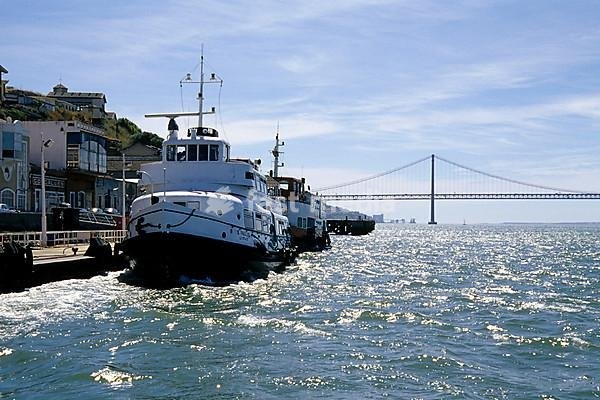 Boat trip with the ferry from Cais do Sodre to Cacilhas at the other riverside of Tejo, Ponte 25 de Abril in the back, suspension bridge, Cacilhas, Lisbon, Portugal, Europe