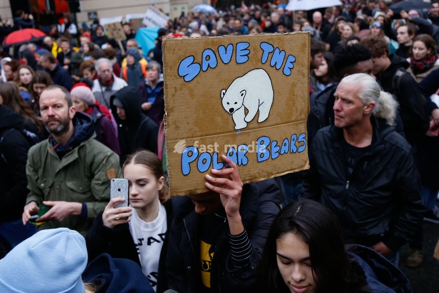 (190316) -- BRUSSELS, March 16, 2019 () -- A person holding a placard takes part in a demonstration against climate change in Brussels, Belgium, March 15, 2019. Thousands of school students across Belgium abandoned classrooms for a day of climate demonstrations on Friday as part of the "Global…