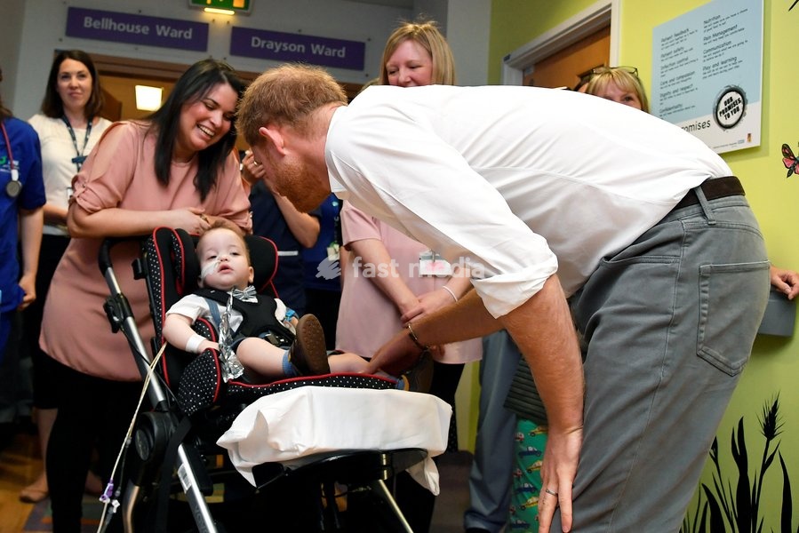 Britain's Prince Harry, Duke of Sussex, meets with a patient, as he visits Oxford Children's Hospital in Oxford, Britain, May 14, 2019