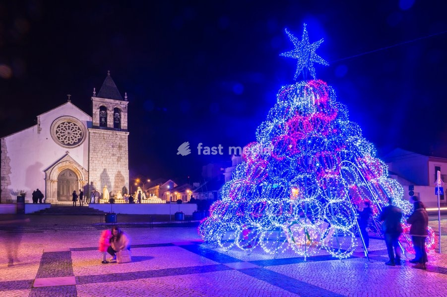 Illuminated modern Christmas tree in front of the Parish Church, Alcochete, Setubal Province, Portugal, Europe