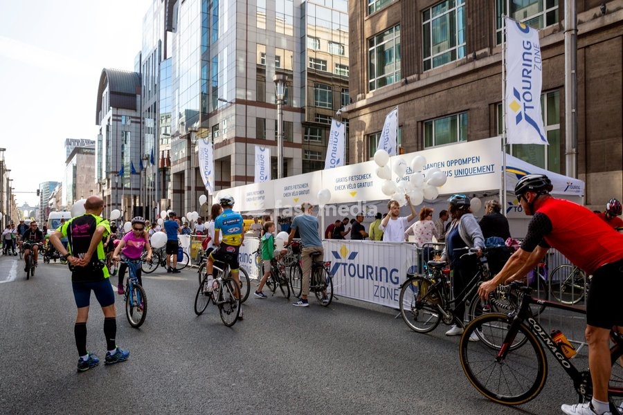 Illustratio shows lots of cyclists and a stand of Touring at the Car Free Sunday in the Brussels Capital region, Sunday 22 September 2019. In several cities and towns across Belgium a Sunday without cars or other motorized transport is organized