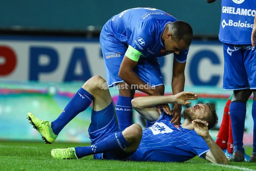 ATTENTION EDITORS - CAPTION CORRECTION - Correcting name of player, not Depoitre but Plastun - Correct version follows: Gent's Igor Plastun lies injured with a nose injury during a soccer match between SV Zulte Waregem and KAA Gent, Sunday 22 September 2019 in Waregem, on day eight of the 'Jupiler…