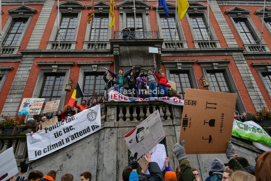 The members of Youth For Climate Liege pictured in front of the city hall of Liege during a gather of the youth Liege for climate. 15.000 students affected by climate problems have walked the streets of Liege. This is the second action of the students of Liege for the climate, Thursday 31 January…