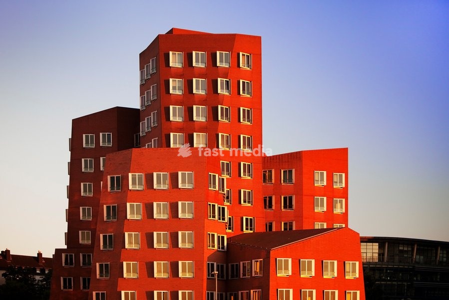 Neuer Zollhof (architect: Frank O. Gehry), detailed view Gehry Bau in the evening light, house A, Düsseldorf, North Rhine Westphalia, Germany, Europe