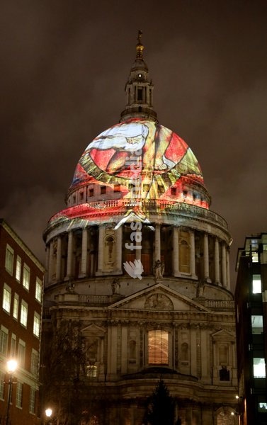 The iconic dome of St Paul's Cathedral is illuminated with William Blake's final masterpiece 'Ancient of Days ,to celebrate the artist's birthday. 27 Nov 2019