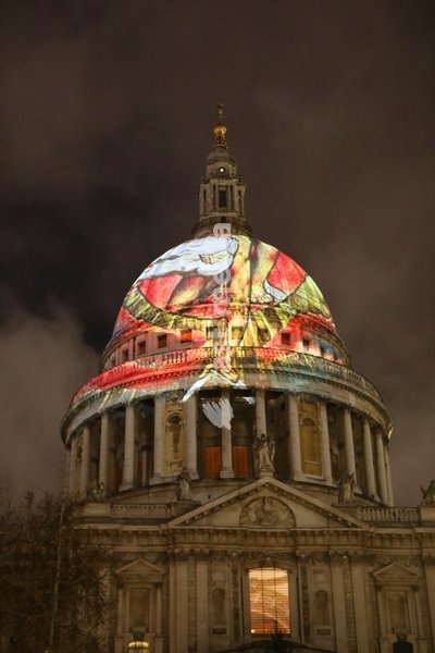 The iconic dome of St Paul's Cathedral is illuminated with William Blake's final masterpiece 'Ancient of Days ,to celebrate the artist's birthday. 27 Nov 2019