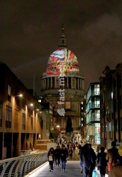The iconic dome of St Paul's Cathedral is illuminated with William Blake's final masterpiece 'Ancient of Days ,to celebrate the artist's birthday. 27 Nov 2019
