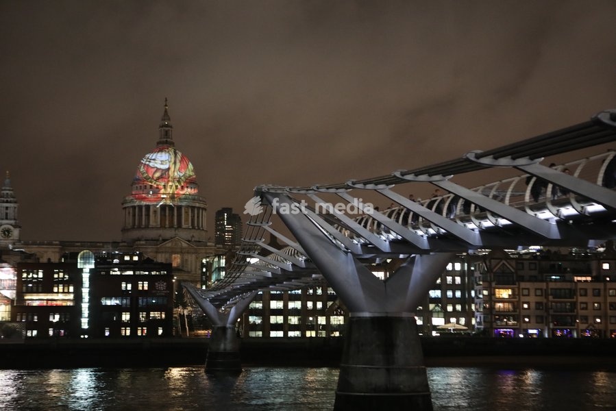 The iconic dome of St Paul's Cathedral is illuminated with William Blake's final masterpiece 'Ancient of Days ,to celebrate the artist's birthday. 27 Nov 2019