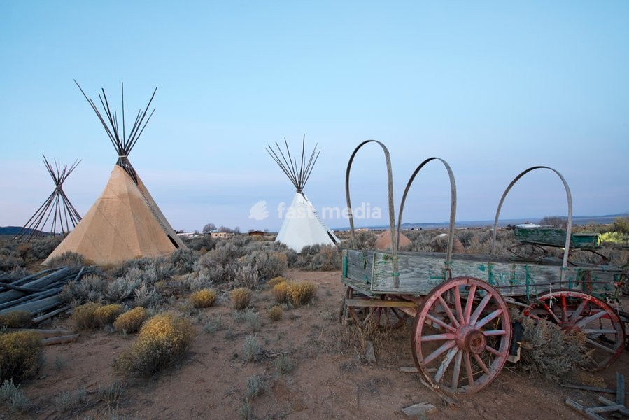 Teepees (tipis) on display at dusk in Taos, New Mexico, United States of America, North America