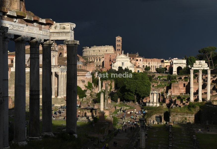 The Roman Forum (Italian: Foro Romano) seen from Capitol Hill. The Forum is a rectangular forum surrounded by the ruins of several important ancient government buildings at the center of the city of Rome. Left: Temple of Saturn (497 BC) Background : The church Santa Francesca Romana and the…